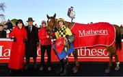 29 December 2022; Jockey Paul Townend and trainer Willie Mullins with winning connections after winning the Matheson Hurdle with State Man on day four of the Leopardstown Christmas Festival at Leopardstown Racecourse in Dublin. Photo by Seb Daly/Sportsfile