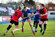 30 December 2022; Claire Gorman of Leinster is tackled by Dolores Hughes of Ulster during the Women's Interprovincial Friendly match between Leinster and Ulster at Energia Park in Dublin. Photo by David Fitzgerald/Sportsfile