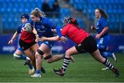 30 December 2022; Ali Coleman of Leinster is tackled by Megan Simpson of Ulster during the Women's Interprovincial Friendly match between Leinster and Ulster at Energia Park in Dublin. Photo by David Fitzgerald/Sportsfile