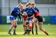 30 December 2022; Emma Murphy of Leinster is tackled by Hannah Beatie of Ulster during the Women's Interprovincial Friendly match between Leinster and Ulster at Energia Park in Dublin. Photo by David Fitzgerald/Sportsfile