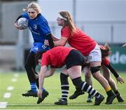 30 December 2022; Anna Doyle of Leinster is tackled by Kelly McCormill, left, and Claire Boles of Ulster during the Women's Interprovincial Friendly match between Leinster and Ulster at Energia Park in Dublin. Photo by David Fitzgerald/Sportsfile