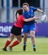 30 December 2022; Catherine Martin of Leinster is tackled by Maeve Liston of Ulster during the Women's Interprovincial Friendly match between Leinster and Ulster at Energia Park in Dublin. Photo by David Fitzgerald/Sportsfile