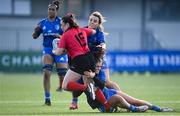 30 December 2022; Maeve Liston of Ulster is tackled by Ella Roberts of Leinster during the Women's Interprovincial Friendly match between Leinster and Ulster at Energia Park in Dublin. Photo by David Fitzgerald/Sportsfile
