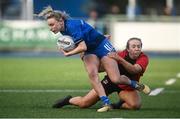 30 December 2022; Emma Tilly of Leinster is tackled by Fern Wilson of Ulster during the Women's Interprovincial Friendly match between Leinster and Ulster at Energia Park in Dublin. Photo by David Fitzgerald/Sportsfile