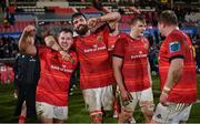 1 January 2023; Munster players, from left, Scott Buckley, Jean Kleyn, Gavin Coombes and Stephen Archer celebrate after the United Rugby Championship between Ulster and Munster at Kingspan Stadium in Belfast. Photo by Ramsey Cardy/Sportsfile