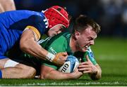 1 January 2023; David Hawkshaw of Connacht scores his side's first try despite the tackle of Josh van der Flier of Leinster during the United Rugby Championship between Leinster and Connacht at RDS Arena in Dublin. Photo by Ben McShane/Sportsfile