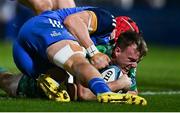 1 January 2023; David Hawkshaw of Connacht scores his side's first try despite the tackle of Josh van der Flier of Leinster during the United Rugby Championship between Leinster and Connacht at RDS Arena in Dublin. Photo by Ben McShane/Sportsfile