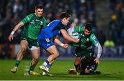 1 January 2023; Tiernan O'Halloran of Connacht is tackled by Rob Russell, left, and Liam Turner of Leinster during the United Rugby Championship between Leinster and Connacht at RDS Arena in Dublin. Photo by Ben McShane/Sportsfile