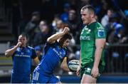 1 January 2023; Jordan Larmour of Leinster celebrates after scoring his side's third try as Peter Dooley of Connacht reacts during the United Rugby Championship between Leinster and Connacht at RDS Arena in Dublin. Photo by Harry Murphy/Sportsfile
