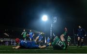 1 January 2023; Josh van der Flier of Leinster scores his side's seventh try despite the tackle of Tom Farrell of Connacht during the United Rugby Championship between Leinster and Connacht at RDS Arena in Dublin. Photo by Ben McShane/Sportsfile