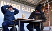 2 January 2023; Former Mayo manager John Maughan, left, and broadcaster and journalist Mike Finnerty prepare their notes before commentating on the challenge match between Mayo and Sligo at James Stephen's Park in Ballina, Mayo. Photo by Piaras Ó Mídheach/Sportsfile