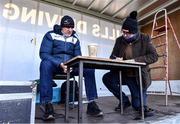 2 January 2023; Former Mayo manager John Maughan, left, and broadcaster and journalist Mike Finnerty prepare their notes before commentating on the challenge match between Mayo and Sligo at James Stephen's Park in Ballina, Mayo. Photo by Piaras Ó Mídheach/Sportsfile