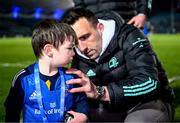 1 January 2023; Jack Conan of Leinster signs a jersey for matchday mascot Oisin Kirwan at Leinster and Connacht in the United Rugby Championship at RDS Arena in Dublin. Photo by Harry Murphy/Sportsfile
