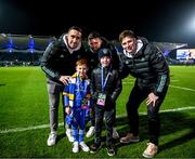 1 January 2023; Matchday mascot Eli Manley-O'Neill with Leinster players, from left, Jack Conan, Ross Byrne and Joe McCarthy at Leinster and Connacht in the United Rugby Championship at RDS Arena in Dublin. Photo by Harry Murphy/Sportsfile