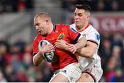 1 January 2023; Keith Earls of Munster is tackled by James Hume of Ulster during the United Rugby Championship between Ulster and Munster at Kingspan Stadium in Belfast. Photo by Ramsey Cardy/Sportsfile