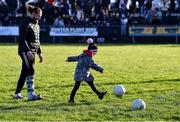 2 January 2023; Mayo footballer Pádraig O'Hora plays with his daughter Mila-Rae, age 5, at half-time during the challenge match between Mayo and Sligo at James Stephen's Park in Ballina, Mayo. Photo by Piaras Ó Mídheach/Sportsfile