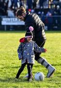 2 January 2023; Mayo footballer Pádraig O'Hora plays with his daughter Mila-Rae, age 5, at half-time during the challenge match between Mayo and Sligo at James Stephen's Park in Ballina, Mayo. Photo by Piaras Ó Mídheach/Sportsfile