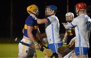 3 January 2023; Pauric Campion of Tipperary and Austin Gleeson of Waterford tussle during the Co-Op Superstores Munster Hurling League Group 1 match between Waterford and Tipperary at Mallow GAA Sports Complex in Cork. Photo by Eóin Noonan/Sportsfile