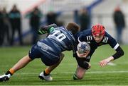 4 January 2023; Finn Craig of North Midlands is tackled by Billy Stanbridge of Metro during the Shane Horgan Cup round three match between Metro and North Midlands at Clontarf RFC in Dublin. Photo by Harry Murphy/Sportsfile