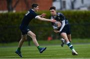 4 January 2023; Ben Barnes of Metro is tackled by Darragh Culligan of North Midlands during the Shane Horgan Cup round three match between Metro and North Midlands at Clontarf RFC in Dublin. Photo by Harry Murphy/Sportsfile