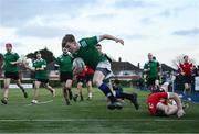 4 January 2023; Daniel Norval of South East evades the tackle of Thomas Kearns of North East on his way to scoring his side's second try during the Shane Horgan Cup Round Three match between South East and North East at Clontarf RFC in Dublin. Photo by Harry Murphy/Sportsfile