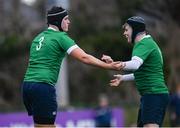 4 January 2023; Kirill Dovbijenko of South East, left, celebrates after scoring his side's first try with teammate Luke Hearne during the Shane Horgan Cup Round Three match between South East and North East at Clontarf RFC in Dublin. Photo by Harry Murphy/Sportsfile