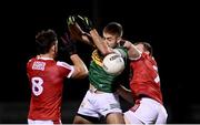 4 January 2023; Adrian Spillane of Kerry in action against Colm O’Callaghan, left, and Mattie Taylor of Cork during the McGrath Cup Group A match between Cork and Kerry at Páirc Ui Rinn in Cork. Photo by Eóin Noonan/Sportsfile