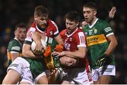 4 January 2023; Barry O'Sullivan of Kerry is tackled by Ian Maguire, left, and Chris Óg Jones of Cork during the McGrath Cup Group A match between Cork and Kerry at Páirc Ui Rinn in Cork. Photo by Eóin Noonan/Sportsfile