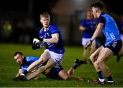 4 January 2023; Kevin Quinn of Wicklow in action against CJ Smith,  left and Dara Newcombe of Dublin during the O'Byrne Cup Group C Round 1 match between Wicklow and Dublin at Baltinglass GAA club in Baltinglass, Wicklow. Photo by Sam Barnes/Sportsfile