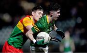 4 January 2023; Jason Scully of Meath in action against Ciaran Moran of Carlow during the O'Byrne Cup Group B Round 1 match between Carlow and Meath at Netwatch Cullen Park in Carlow. Photo by Ray McManus/Sportsfile