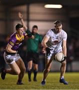 4 January 2023; Darragh Kirwan of Kildare in action against Eoin Porter of Wexford during the O'Byrne Cup Group A Round 1 match between Wexford and Kildare at St Patrick's Park in Enniscorthy, Wexford. Photo by Piaras Ó Mídheach/Sportsfile