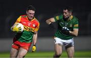 4 January 2023; Jordan Morrissey of Carlow in action against Donal Keogan of Meath during the O'Byrne Cup Group B Round 1 match between Carlow and Meath at Netwatch Cullen Park in Carlow. Photo by Ray McManus/Sportsfile