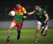 4 January 2023; Jordan Morrissey of Carlow in action against Donal Keogan of Meath during the O'Byrne Cup Group B Round 1 match between Carlow and Meath at Netwatch Cullen Park in Carlow. Photo by Ray McManus/Sportsfile