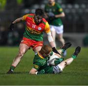 4 January 2023; James O'Hare of Meath in action against Conor Crowley of Carlow during the O'Byrne Cup Group B Round 1 match between Carlow and Meath at Netwatch Cullen Park in Carlow. Photo by Ray McManus/Sportsfile
