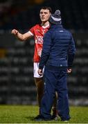4 January 2023; Daniel O’Mahony of Cork speaking with Cork manager John Cleary after the McGrath Cup Group A match between Cork and Kerry at Páirc Ui Rinn in Cork. Photo by Eóin Noonan/Sportsfile
