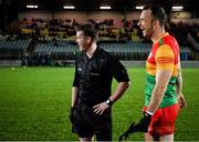 4 January 2023; Referee Darragh Byrne with the Carlow captain Darragh Foley as they await the arrival of the Meath captain before the O'Byrne Cup Group B Round 1 match between Carlow and Meath at Netwatch Cullen Park in Carlow. Photo by Ray McManus/Sportsfile