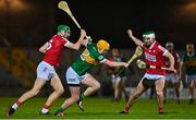 5 January 2023; Conor O'Keeffe of Kerry is tackled by Mark Keane and Shane Kingston of Cork during the Co-Op Superstores Munster Hurling League Group 2 match between Kerry and Cork at Austin Stack Park in Tralee, Kerry. Photo by Brendan Moran/Sportsfile