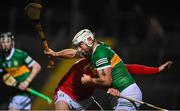 5 January 2023; Mikey Boyle of Kerry is tackled by Declan Dalton of Cork during the Co-Op Superstores Munster Hurling League Group 2 match between Kerry and Cork at Austin Stack Park in Tralee, Kerry. Photo by Brendan Moran/Sportsfile