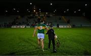 5 January 2023; Bobby Boyle helps his father, Kerry hurler Mikey Boyle, carry his hurleys and helmet as they leave the pitch after the Co-Op Superstores Munster Hurling League Group 2 match between Kerry and Cork at Austin Stack Park in Tralee, Kerry. Photo by Brendan Moran/Sportsfile