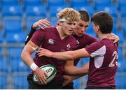 6 January 2023; Hugh Gavin of Ireland, left, is congratulated by teammates Sam Prendergast, centre, and John Devine after scoring their side's fourth try during a friendly match between Ireland U20 and Leinster Development at Energia Park in Dublin. Photo by Seb Daly/Sportsfile