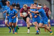 6 January 2023; Hugh Gavin of Ireland evades the tackle of Leinster's Sam Berman on his way to scoring his side's fourth try during a friendly match between Ireland U20 and Leinster Development at Energia Park in Dublin. Photo by Seb Daly/Sportsfile