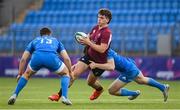 6 January 2023; John Devine of Ireland is tackled by Charlie Tector, right, and Ben Brownlee of Leinster during a friendly match between Ireland U20 and Leinster Development at Energia Park in Dublin. Photo by Seb Daly/Sportsfile