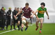6 January 2023; Billy Mannion of Galway in action against Donal Casey of Leitrim during the Connacht FBD League Round 1 match between Leitrim and Galway at the NUI Galway Connacht GAA Air Dome in Bekan, Mayo. Photo by David Fitzgerald/Sportsfile