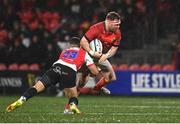 6 January 2023; Dave Kilcoyne of Munster is tackled by Manuel Rass of Emirates Lions during the United Rugby Championship between Munster and Emirates Lions at Musgrave Park in Cork. Photo by Eóin Noonan/Sportsfile