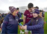 6 January 2023; Johnny Heaney of Galway stands for a selfie with Isabelle Mulrooney, age 12, from Ballygar, Galway after the Connacht FBD League Round 1 match between Leitrim and Galway at the NUI Galway Connacht GAA Air Dome in Bekan, Mayo. Photo by David Fitzgerald/Sportsfile
