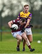7 January 2023; Lorcan Dolan of Westmeath in action against Ryan Furlong of Wexford during the O'Byrne Cup Group A Round 2 match between Westmeath and Wexford at The Downs GAA club in Mullingar, Westmeath. Photo by Sam Barnes/Sportsfile