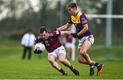 7 January 2023; Lorcan Dolan of Westmeath in action against Ryan Furlong of Wexford during the O'Byrne Cup Group A Round 2 match between Westmeath and Wexford at The Downs GAA club in Mullingar, Westmeath. Photo by Sam Barnes/Sportsfile