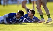 7 January 2023; Laois players Trevor Collins and Damon Larkin, left, look on after trying to stop a Meath attack during the O'Byrne Cup Group B Round 2 match between Meath and Laois at Páirc Tailteann in Navan, Meath. Photo by Piaras Ó Mídheach/Sportsfile