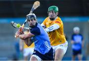 7 January 2023; Cian Boland of Dublin in action against Conal Bohill of Antrim during the Walsh Cup Group 1 Round 1 match between Dublin and Antrim at Parnell Park in Dublin. Photo by Tyler Miller/Sportsfile
