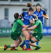 7 January 2023; Aoife Moore of Leinster is tackled by Elizabeth McNicholas, left, and Fiona Scally of Connacht during the Vodafone Women’s Interprovincial Championship Round One match between Leinster and Connacht at Energia Park in Dublin. Photo by Seb Daly/Sportsfile